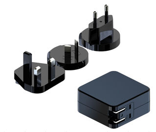 購入 イギリスEUのKAのAUのプラグが付いている交換可能なアダプターの壁の台紙5V-15V online manufacture